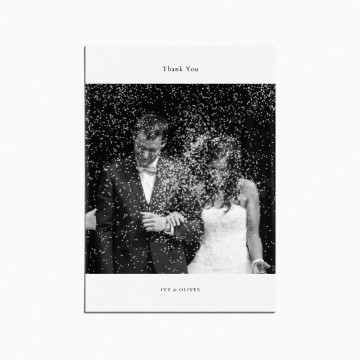 thank you card with an image of a married couple walking out of a chapel and getting rice thrown on them