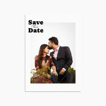 Save the Date wedding invitation card showcasing "Save the Date" written in a script font and an image of two people embracing