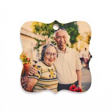 Wooden ornament with an image of a senior couple