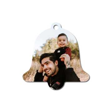 Metal ornament with an image of a father and his child