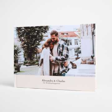Hardcover photo book with young couple travel photos
