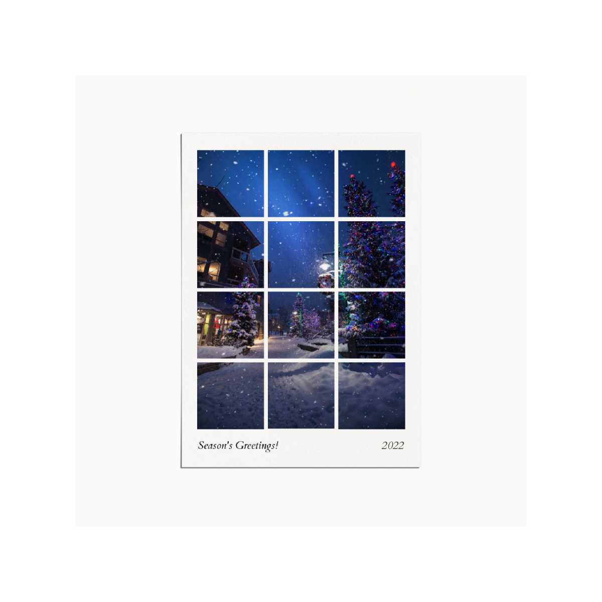 Holiday card with a grid image depicting a christmas village in the evening