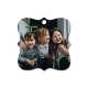 Metal ornament with an image of 3 children hugging