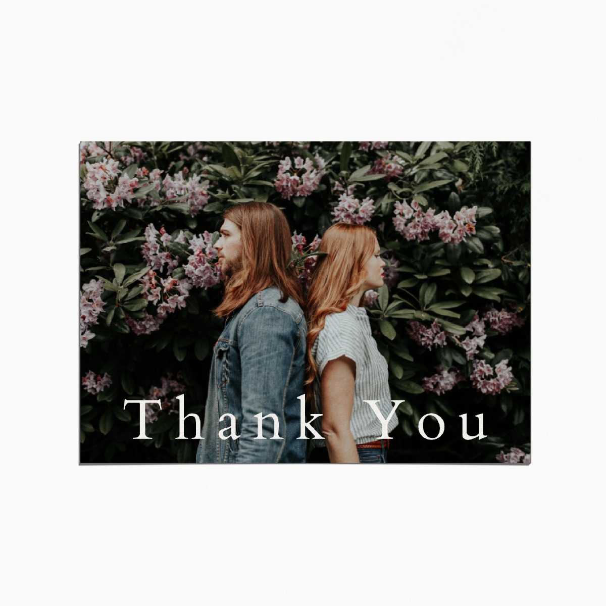 thank you card with an image of a couple standing back to back on front of a magnolia tree