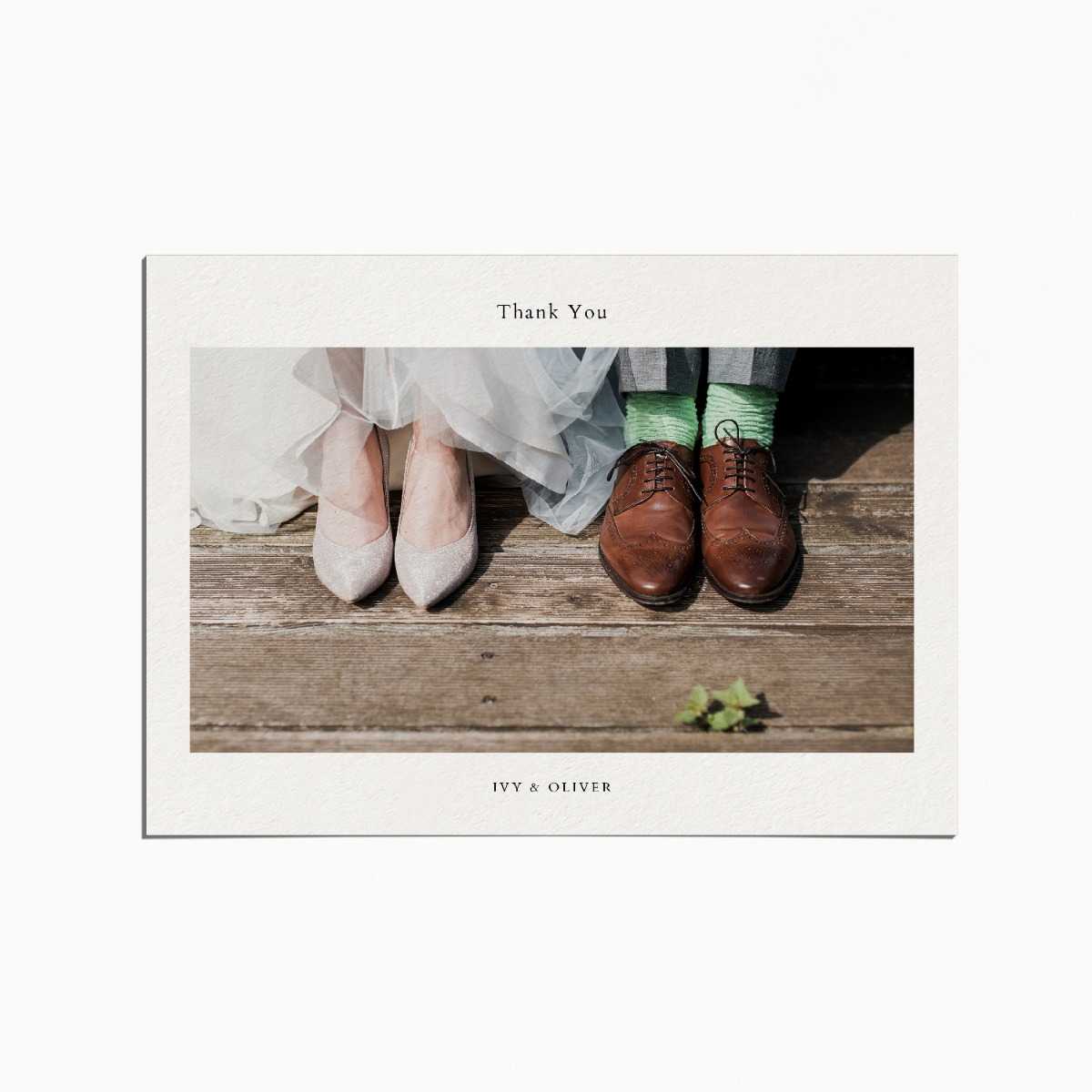 thank you card with an image of two pairs of shows belonging to a bride and groom