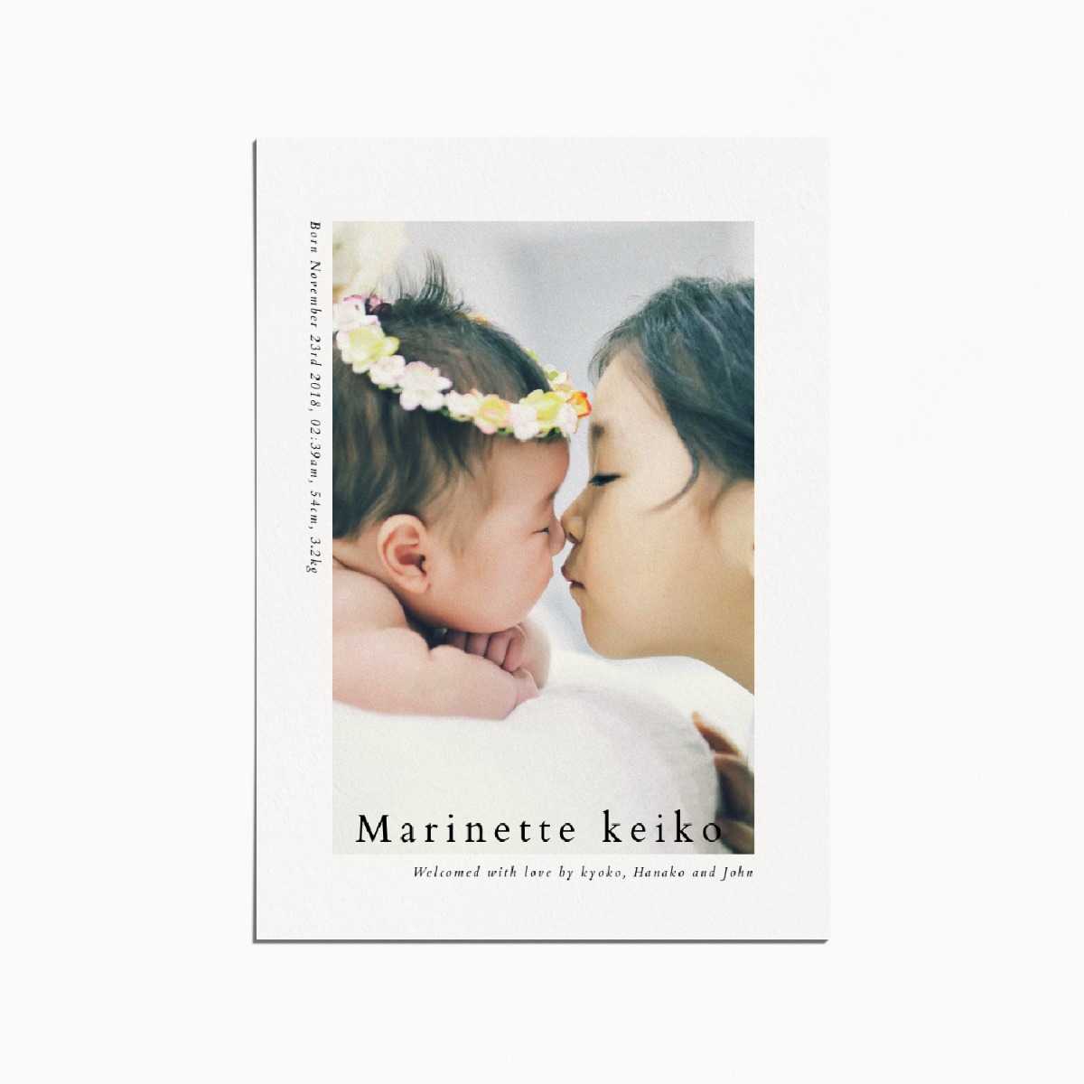 Birth announcement card with an image of a newborn baby and their older sister