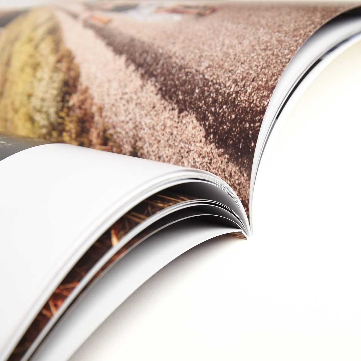 Open softcover photo book 