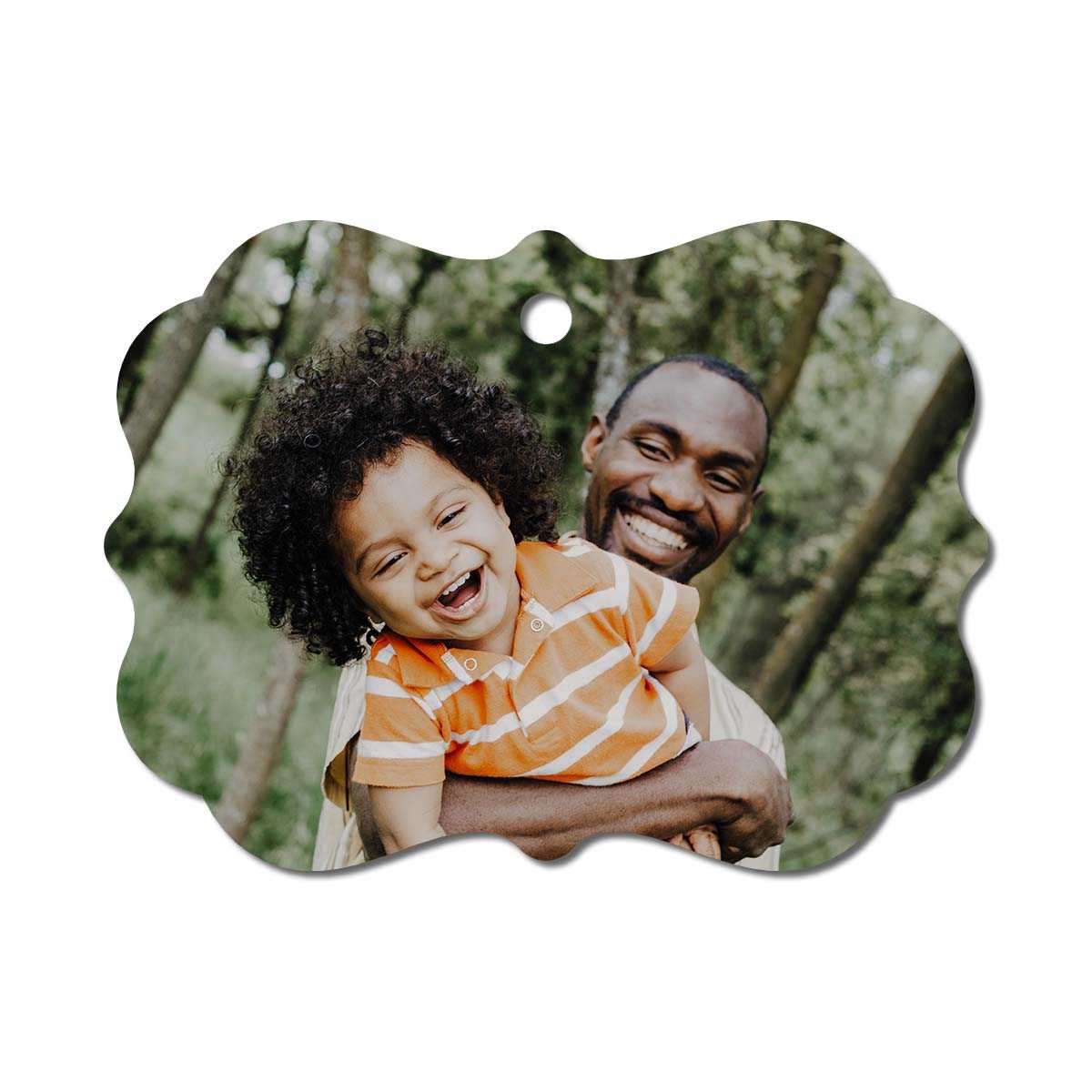 Metal ornament with an image of a father and his child