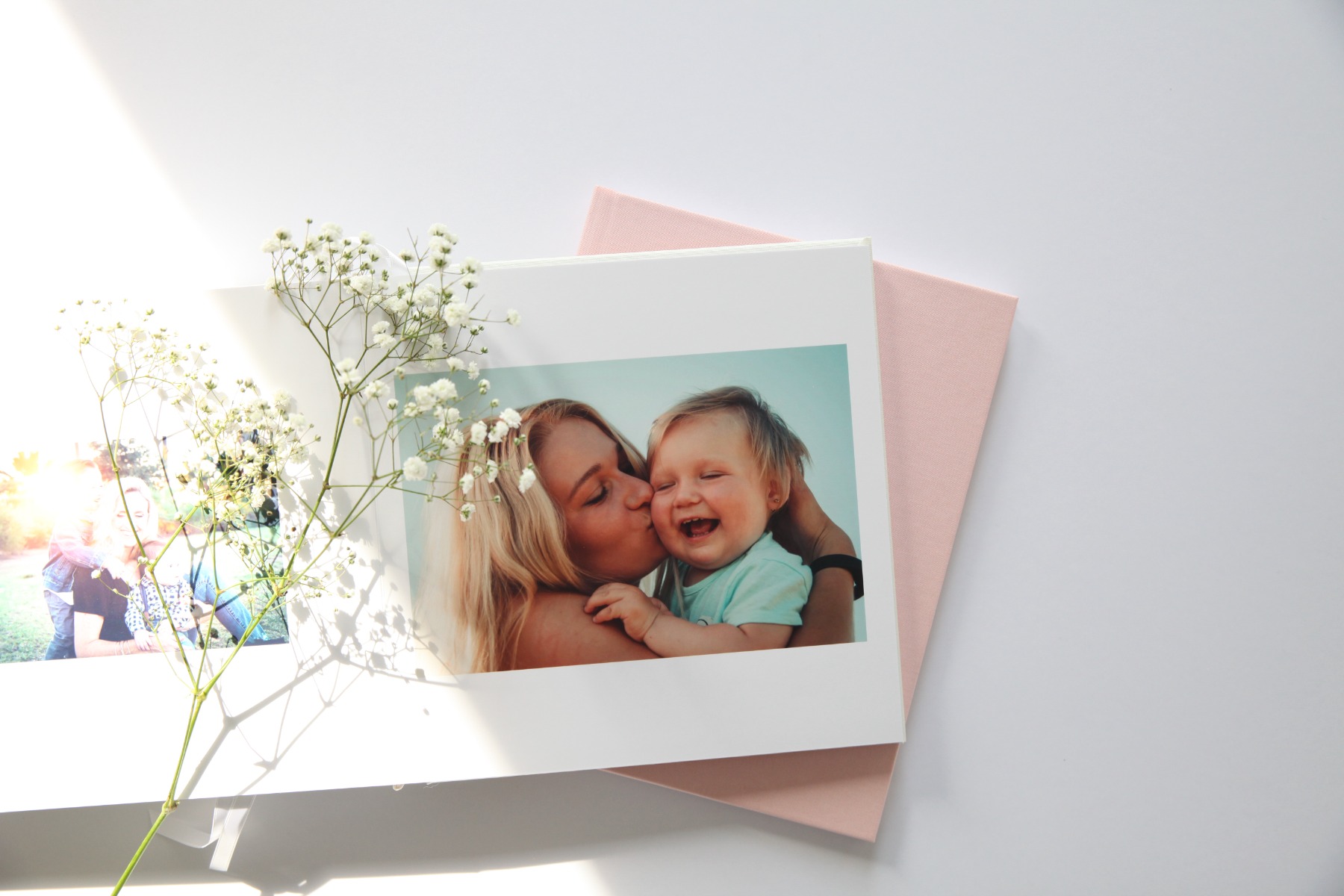 Picture of Mother and Baby in Photo Album with Baby's breath Flowers 